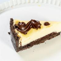 Black Bottom Cheesecake · Our rich and creamy vanilla cheesecake on top of a chocolate cake base topped with chocolate...
