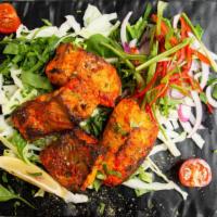 Chutney Salmon Tikka · Salmon cooked in tandoor, marinated with lemon and mint coriander chutney. Also available as...