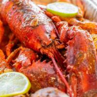 C5 · 1 cluster snow crab legs, 0.5 lb shrimp (head-off), 1 whole lobster. Served with 1 corn, 1 e...