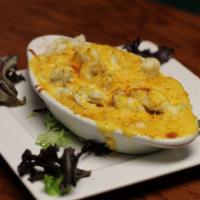 Crab Mac & Cheese · Fresh mac and cheese paired with lump and colossal crab meat, topped with blended cheese and...