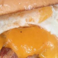 Morning After Burger · Black Angus hand pattied burger topped with cheese, bacon, and a fried egg, served with mayo.