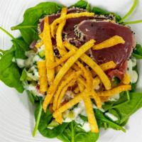 Asian Tuna Salad · Gluten free. Sesame seared rare tuna on our spinach salad drizzled with cusabi dressing, won...