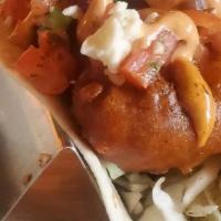 I Think We Need A Bigger Boat · Fresh beer battered cod on top of a bed of slaw tossed lime juice and cilantro topped with h...