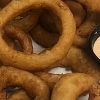 Onion Rings · Generous portion of crispy beer battered onion rings served with Chipotle mayo.