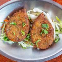 Vegetable Cutlet · Deep-fried potato patty mixed with vegetables.
