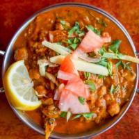 Channa Masala · Chickpeas cooked in blend of tomato, onion and herb-based sauce.
