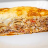 Homemade Lasagna  · Ground beef, sausage, ricotta cheese, parmesan, mozzarella and homemade sauce