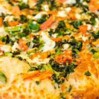 White Pizza · Garlic, olive oil, sauce, tomatoes, broccoli, spinach, ricotta cheese, mozzarella.