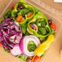 Garden Salad · Romaine lettuce, tomato, green pepper, onion, pepperoncini, red cabbage, carrot, olives, cho...