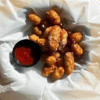 Cheese Curds · Lightly breaded and fried, served with marinara