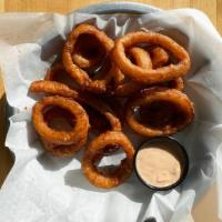 Beer Battered Onion Rings · Served with sriracha-ranch sauce