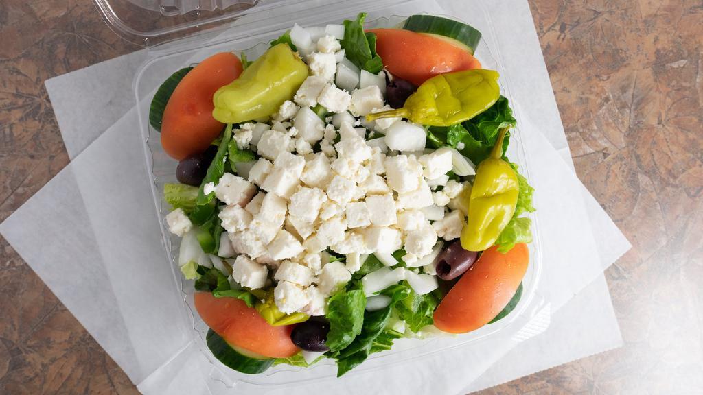 Greek Salad · Feta cheese, olives, pepperoncini peppers over our tossed salad.