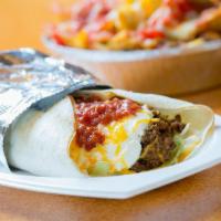 Burrito Supremo · Our traditional burrito filled with your choice of beef, refried beans or a combination of t...
