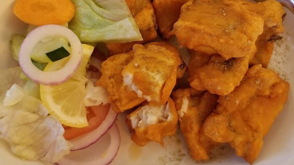 Fish Pakora · Fish spiced and dipped in chickpea batter.