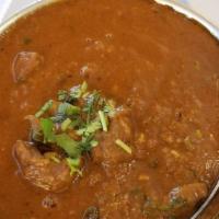 Lamb Curry · Boneless lamb cooked with onions, tomatoes, and Nepali spices.