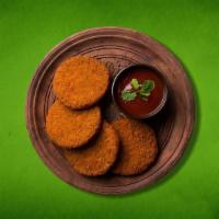 Mash Browns(Vegan) · Fried-potato patty stuffed with peas and served with spicy relish.