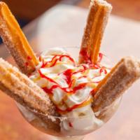 Churros With Ice Cream · Four pastry strips covered with sugar, chocolate, whipped cream a scoop of vanilla ice cream...