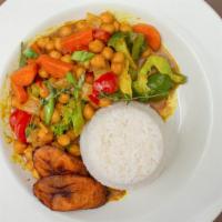 Curried Chickpeas · Garbanzo beans in curry spices with bell peppers, broccoli and onions.