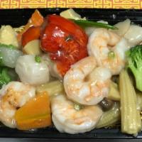 Seafood Delight · A combination of scallops jumbo shrimp and crabmeat with Chinese vegetables.