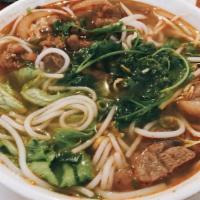Hot Beef Rice Noodle Soup · Spicy beef rice noodle soup with lemon grass and pig's knuckle.