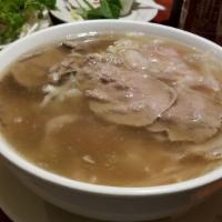 Special Pho (Large Bowl) · With slice of eye-of-round steak, well done flank, fat brisket, soft tendon and bible tripe.