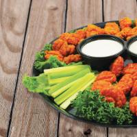 Group Wing Combo · 40 piece wings, two large french fries, two veggies, four dipping sauces.
For Mix & Match Wi...