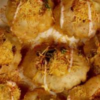 Sev Batata Poori · Vegan. 8 small crispy puffs stuffed with potatoes, chickpea, onion, green and sweet chutney,...