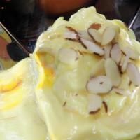 Shrikhand · Gujarat dessert made from sweetened yogurt, cardamom powder, saffron and nuts.