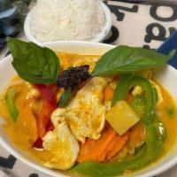 Yellow Curry (Spicy) · A less spicy Thai yellow curry cooked with coconut milk, carrots, onions, bell peppers and p...