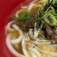 Tender Beef Noodle Soup · Authentic marinated beef soup with your choice of noodles, bean sprouts and seasonal fresh g...