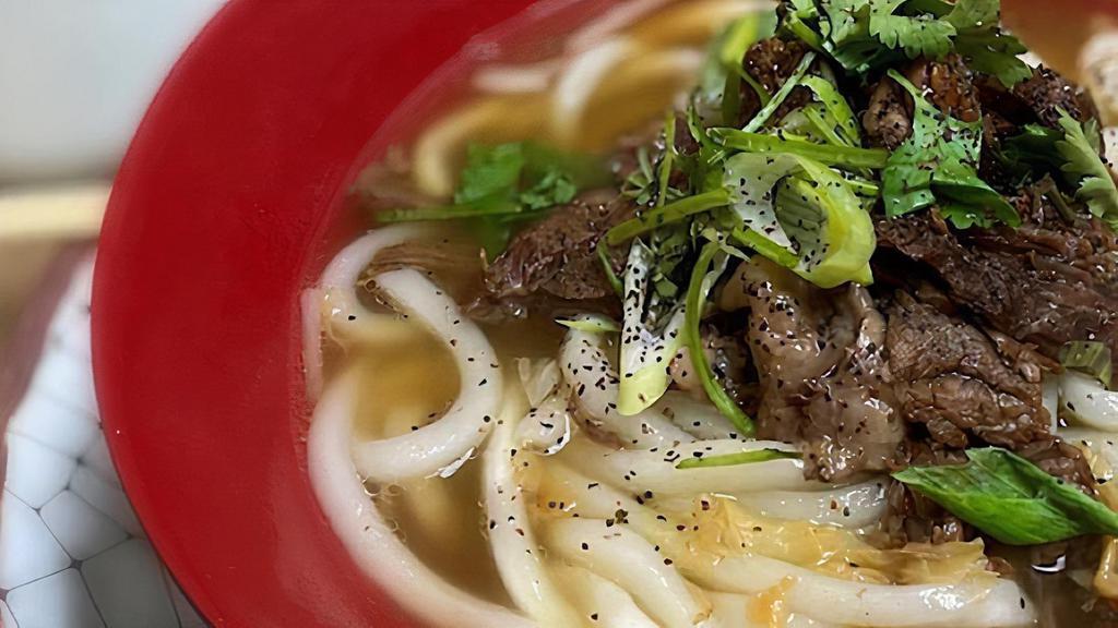 Tender Beef Noodle Soup · Authentic marinated beef soup with your choice of noodles, bean sprouts and seasonal fresh green Asian veggies in a delicious brown broth