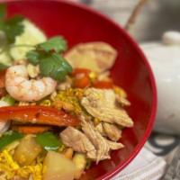 Pineapple Fried Rice · Stir-fried yellow rice with Chicken and Shrimp (can substitute protein), pineapples, cashew ...