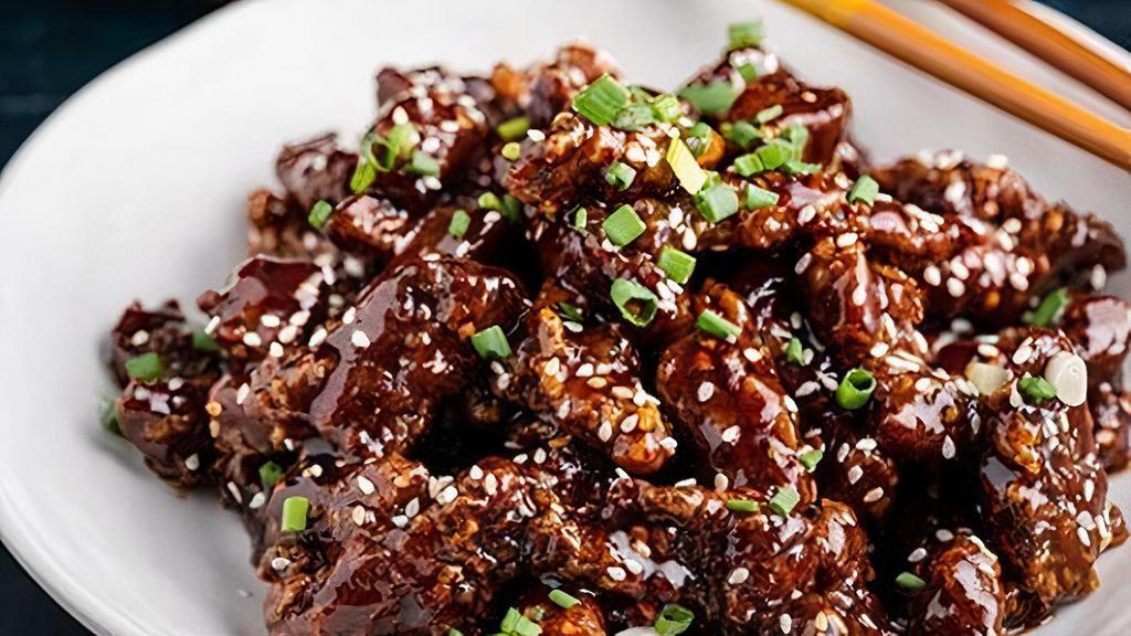 Crispy Caramel Lemongrass Chili Beef  (Spicy) · Textured strips of sweet and crispy beef with the delicious 3 flavor of sweet honey sour lemongrass and tiny spicy chili sauce