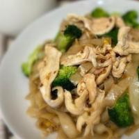 Pad See-Iew With Chicken · Pan fried rice noodles with Chicken (can substitute protein), egg and broccoli in light soy ...