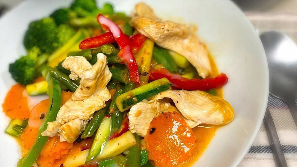 Pad Panang (Spicy) · Stir-fried chicken (can substitute protein) with string beans, bell peppers and carrots in a Red curry, topped with shredded Kaffir-lime leaves and drizzled with a coconut milk sauce . Served with jasmine rice.