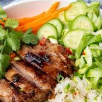 Grilled Pork With Rice · Grilled pork marinated with lemongrass and Thai spices served with jasmine rice, mixed salad...