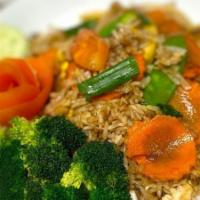V-N6. Spice And Dice Fried Rice (Vegan) · Thai style stir-fried Jasmine rice, tofu (can substitute protein), sliced sweet onions, scal...