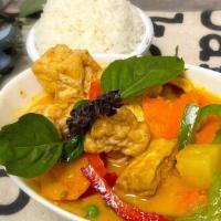 V-C4. Yellow Curry (Vegan) · A less spicy Thai yellow curry cooked with coconut milk, carrots, onions, bell peppers and p...