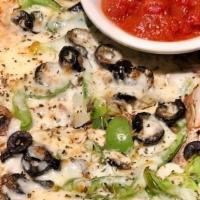 Veggie Flatbread · Flatbread topped with garlic olive oil sauce green peppers, onions, black olives & mushrooms...
