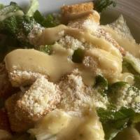 Caesar Salad · Romaine lettuce, Parmesan cheese, creamy Caesar dressing and garlic croutons.