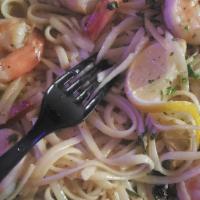 Shrimp Scampi Dinner · Gulf shrimp, white wine garlic-lemon sauce and linguine.