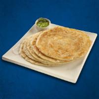 Plain Classic Paratha(Vegan) · House made pulled and leavened dough  baked to perfection in an Indian clay oven