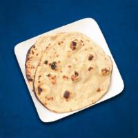 Tandoori Roti(Vegan) · Whole wheat flat bread baked to perfection in an Indian clay oven