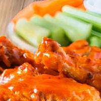 Wings · Served with celery and bleu cheese or ranch. Extra bleu cheese or ranch for an additional ch...