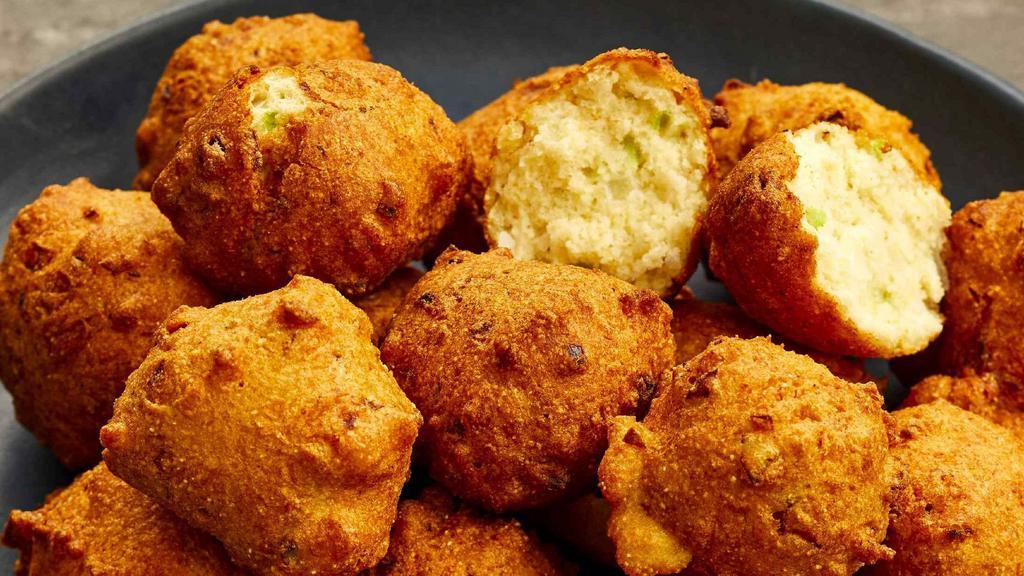 Hushpuppies · Hushpuppies Served with 10 pieces. Served with marinara sauce.