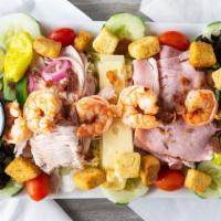 Chef'S Salad · House salad with ham, turkey, swiss, shrimp, black olives, egg & bleu cheese crumbles.