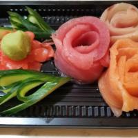 Sashimi Regular 生鱼片 [ B1 ] · Twelve pieces assorted slices of raw fish. Served with miso soup.