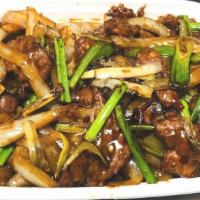 Mongolian Beef 蒙古牛 · Hot and spicy. Served with rice.