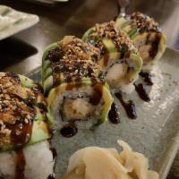 Dragon Roll · Eel and cucumber wrapped with a layer of avocado.