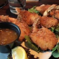 Coconut Shrimp · Jumbo gulf shrimp lightly breaded in coconut, golden fried and served with orange marmalade ...